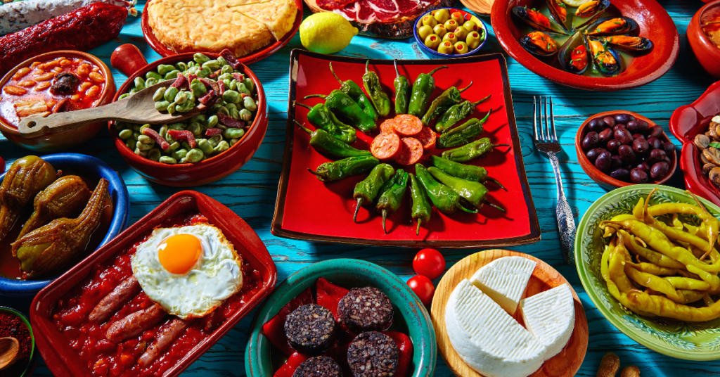 Mediterranean Recipes: A colorful display of Mediterranean recipes featuring Greek salad, grilled chicken shawarma, falafel bowls, and tabouli salad.